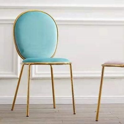 Modern Velvet Dining Chair with Iron Plated Golden Legs Used in Apartment